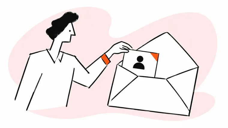 A person places a profile card inside a large open envelope.