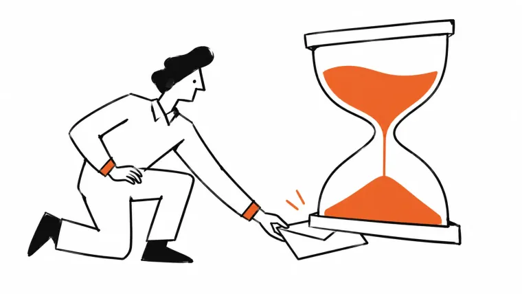 A person retrieves a delayed envelope from beneath a large hourglass.